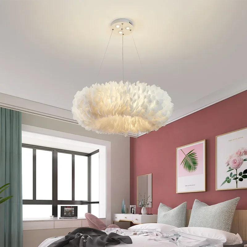 Modern chandelier in a bedroom with pink walls and decor