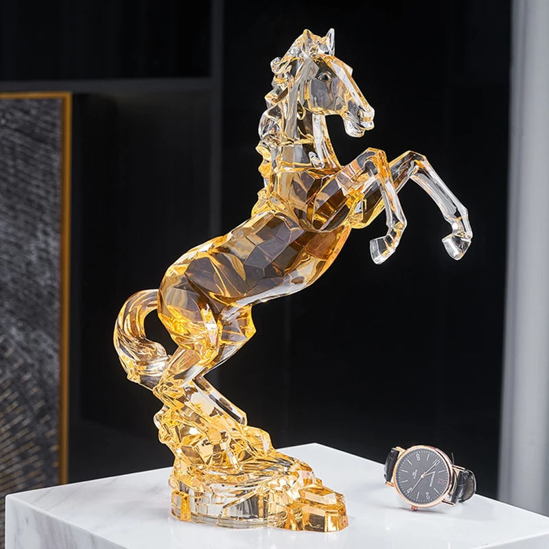 Crystal horse figurine on a white surface with a watch next to it.