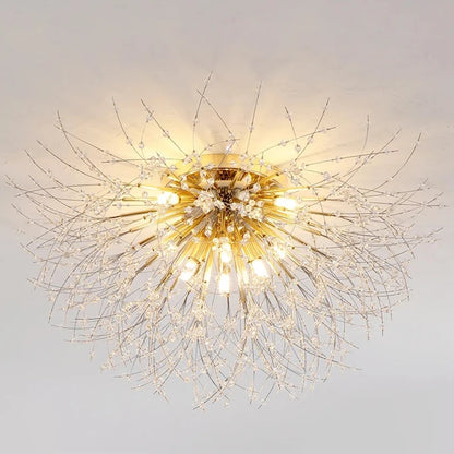 Decorative ceiling light fixture with gold and crystal design on a plain background